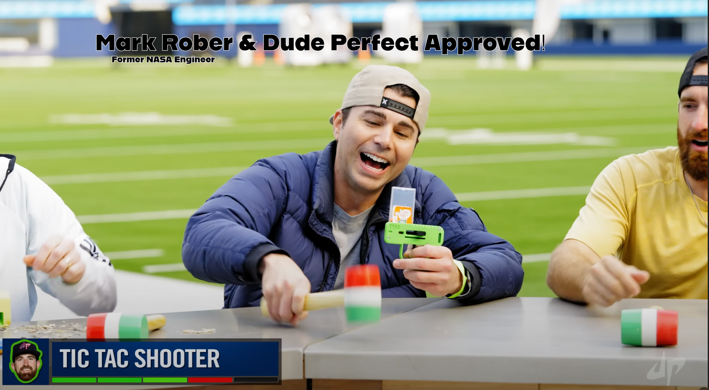Dude Perfect and Mark Rober playing with a Tic Tac Shooter in Sofi Stadium football field